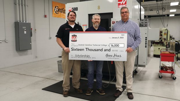 Haas Specialist Eric Eargle presents a Gene Haas Foundation check to Central Carolina Technical College Academic Program Manager for Machining and CNC Technology Eddie Humphries and Dean for Advanced Manufacturing and Engineering Technology Bert Hancock.