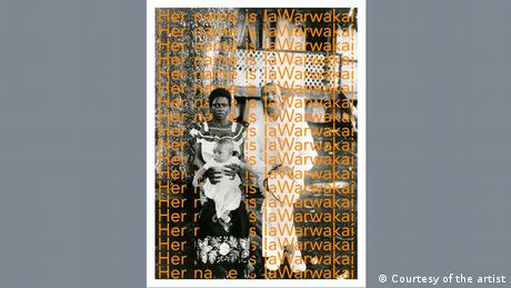 An African woman holds a baby while sitting next to a white man in a white suit. The words Her name is laWarwakai is written on the image