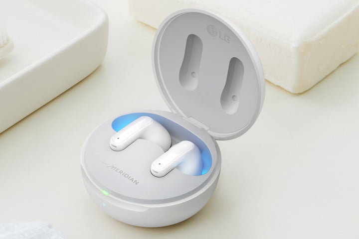 LG Tone Free FP8 True Wireless Earbuds on a white surface.