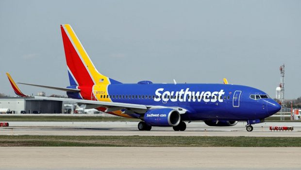 Southwest apologizes and blames technology glitch for hundreds of flight cancelations and more than 1,000 delays