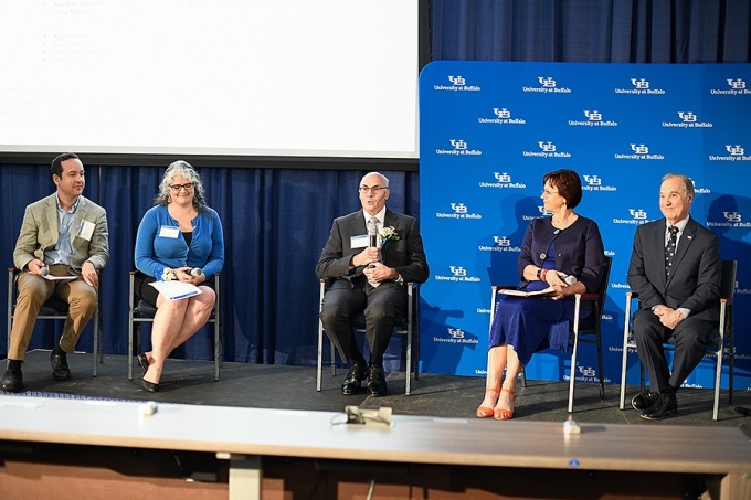 A panel of faculty experts joins Drew Weissman (center) on stage for a Q&A session. From left are Jonathan F. Lovell, Jennifer A. Surtees, Gabriela K. Popescu and Thomas A. Russo. 