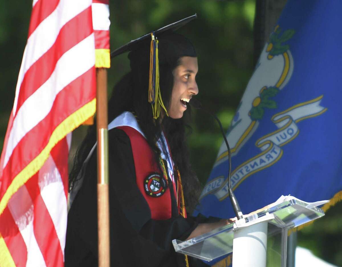 Student Council President Aishwarya Sivasubramanian speaks during the 2022 commencement ceremony at Academy of Information Technology & Engineering magnet high school in Stamford, Conn. Monday, June 20, 2022.