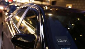 The logo for Uber Technologies is seen on a vehicle in Manhattan, New York City
