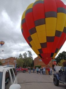 Albuquerque balloon fiesta - balloon lands at a stree tcorner