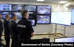 Serbian Interior Minister Aleksandar Vulin with police chief Vladimir Rebic while visiting a police station in Belgrade in 2021.