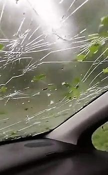 Car Hammered by Hail