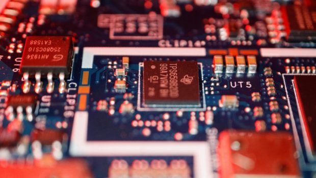 Semiconductor chips are seen on a circuit board of a computer in this illustration picture taken February 25, 2022. Photo ...