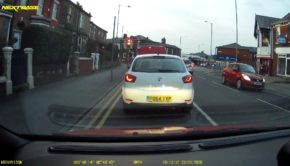 Cyclist Tries to Play off Breaking Side-View Mirror