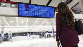 Delta's new airport tech shows personalized flight info on huge screen
