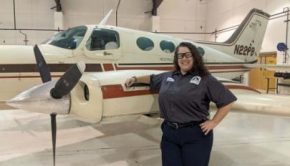 GNTC student Theresa Harper stands next to a plane in the GNTC Aviation Training Center hangar. Ms. Harper is the recipient of the HAI/WAI Maintenance Technician Certificate Scholarship and will receive recognition at the 32nd Annual International Women in Aviation Conference in March.