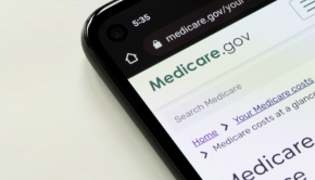 A phone screen displays the Medicare.gov website.