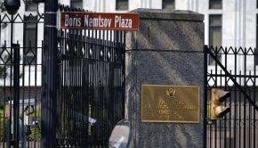 FILE: A street sign marking Boris Nemstov Plaza is seen at the entrance of the Embassy of the Russian Federation in Washington, Thursday, April 15, 2021. (AP Photo/Carolyn Kaster)
