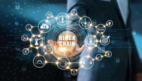 Blockchain technology and network concept. Businessman holding text blockchain in hand with icon network connection on blue security and digital connection background