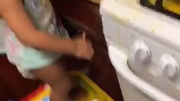 Little Girl Cracks Carton Full Eggs Making a Huge Mess in Kitchen