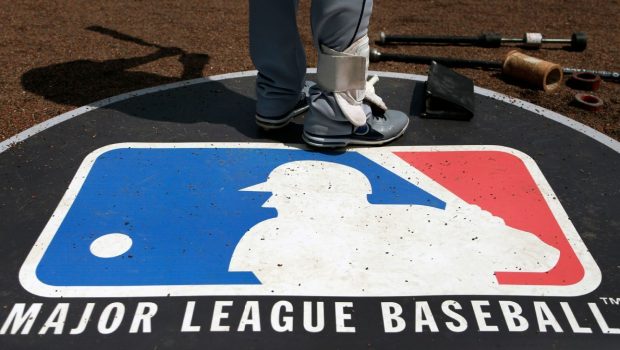 MLB to allow pitchers, catchers to use anti-sign-stealing technology during regular season, sources say