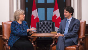 May urges Trudeau to go to climate summit as PM seeks common ground with Greens
