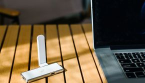 A VPN device next to a laptop