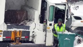 Side Loader Garbage Truck Collecting Garbage 1-28-2019