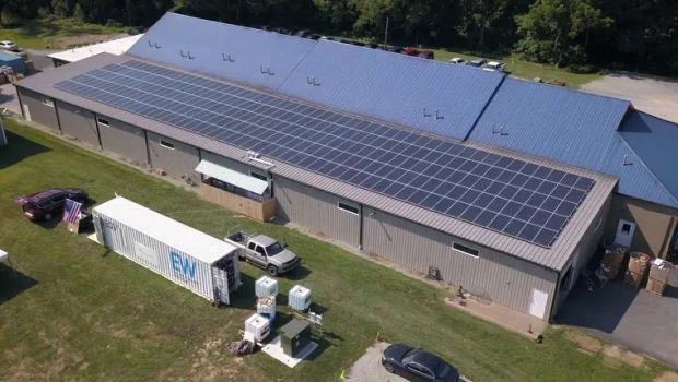 Sycamore International Inc., a Chester County electronics recycler and renovator, wanted to use renewable power around the clock, so it installed a cutting-edge battery system along with its 115-kilowatt rooftop solar system. The iron-flow battery storage system, built by ESS Tech, is located in the white shipping container in the foreground.
