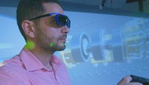 Hamza Al-Jundi demonstrates the technology available in EMU’s new Virtual Reality Accelerated Prototyping  (VRAP) lab in the 2019 photo.
